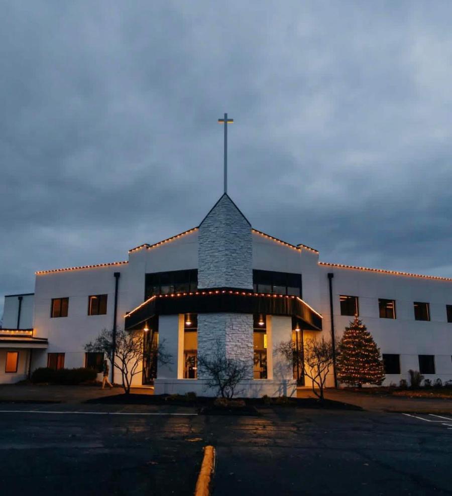Church with warm white roofline lights